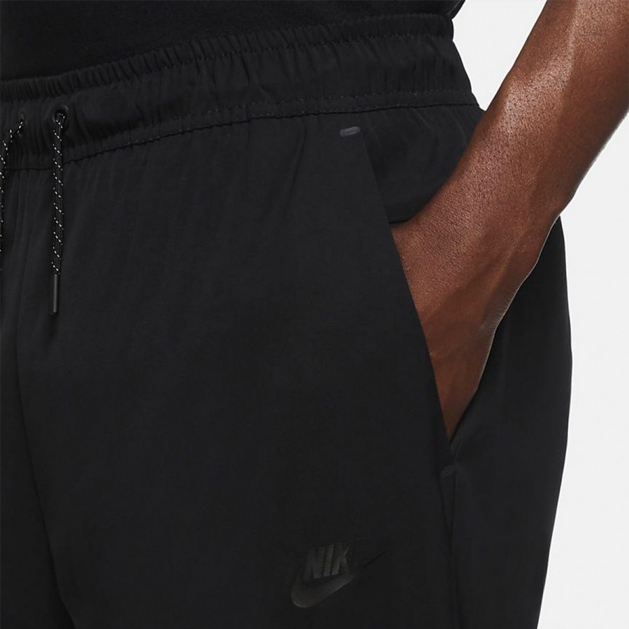 NIKE Pantaloni de trening M NSW TE+ WVN RPL LND PANT 