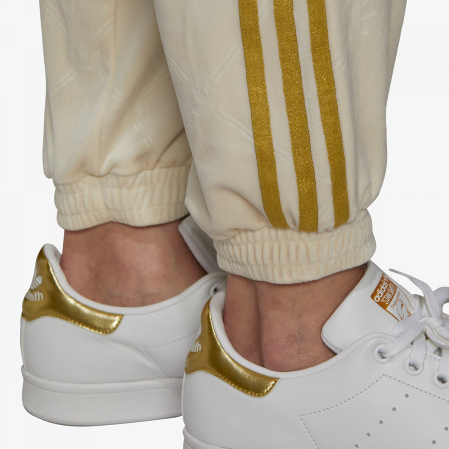 ADIDAS Pantaloni TRACK PANTS IN VELVET WITH EMBOSSED ADIDAS ORIGINALS MONOGRAM AND GOLD STRIPES<br /> 