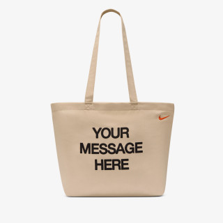 NIKE Genti NK HERITGE TOTE GFX YR MSG HRE 